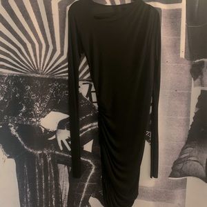 Cheryl Herger long sleeve black asymmetrical ruched dress.